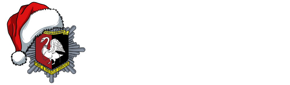 Bucks fire logo crest with Christmas hat on it